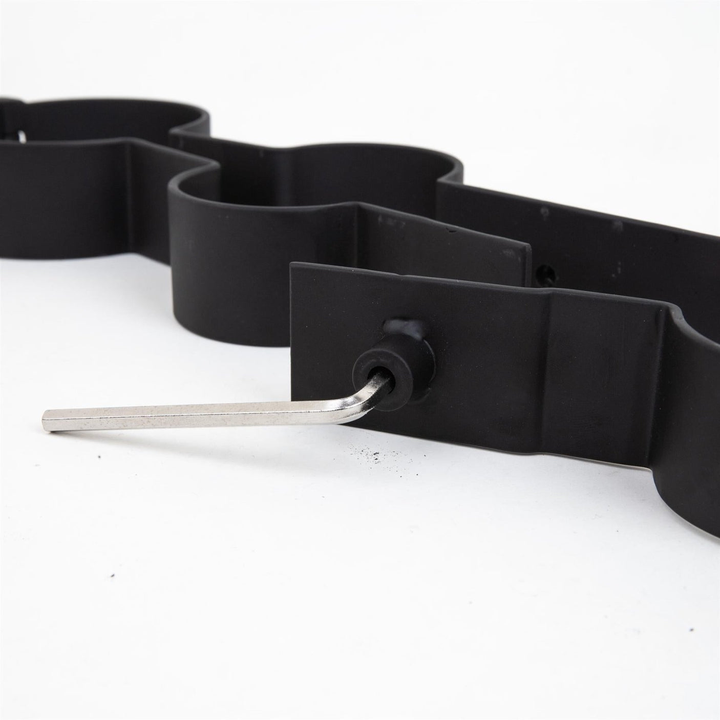 Steel wrist to ankle spreader, Black from Fetters.