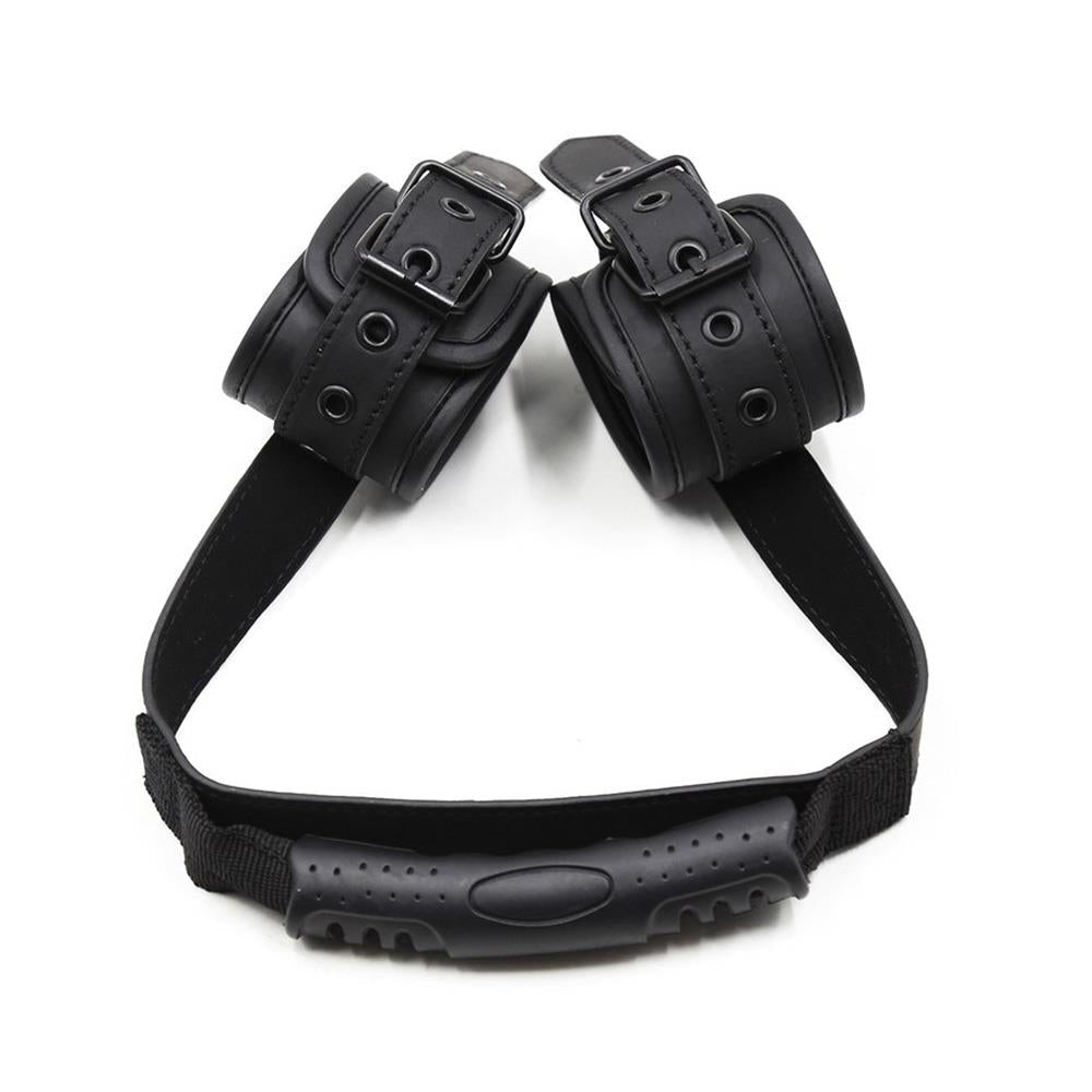 Black Wrist Cuffs with a Pull Handle from Kinky Puppy.