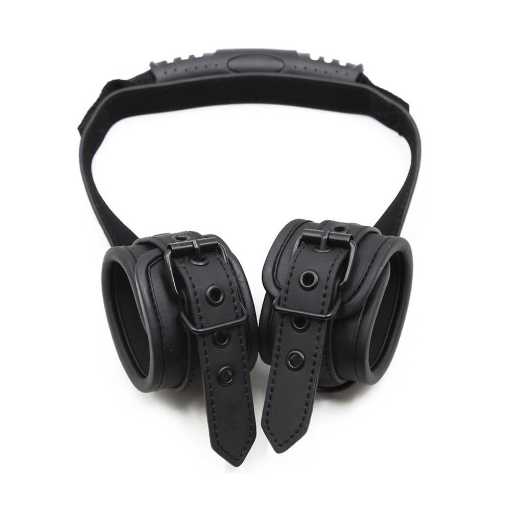 Black Wrist Cuffs with a Pull Handle from Kinky Puppy.