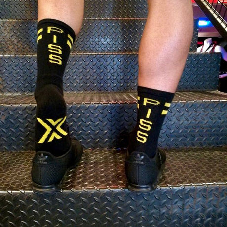 Boxer Skater Socks, PISS, Black/Yellow from Boxer Barcelona.