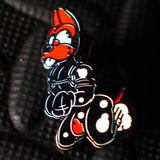 Rubber Dog Enamel Pin, Red from James Newland Illustration.