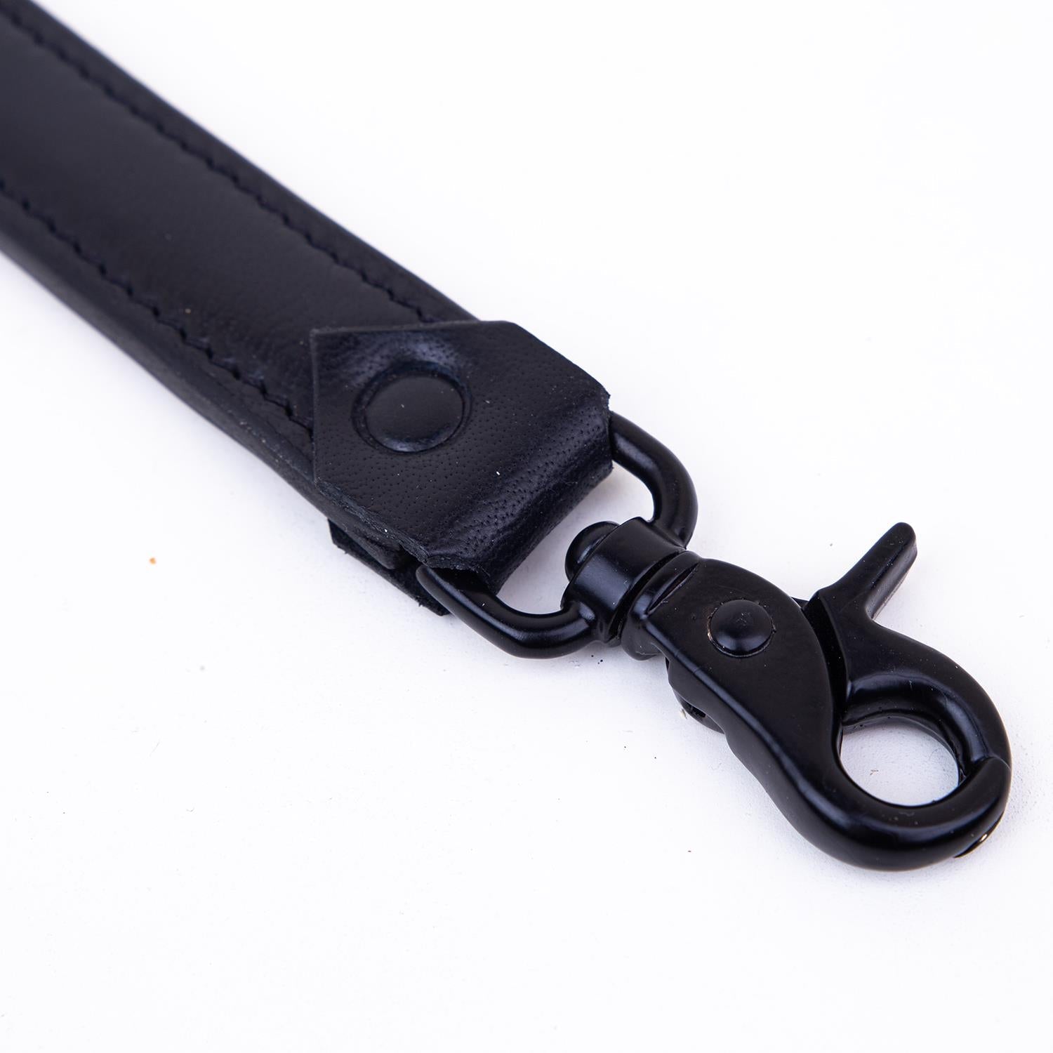 The Claw - Studded Ballbuster Paddle, Black & Red from Fetters.